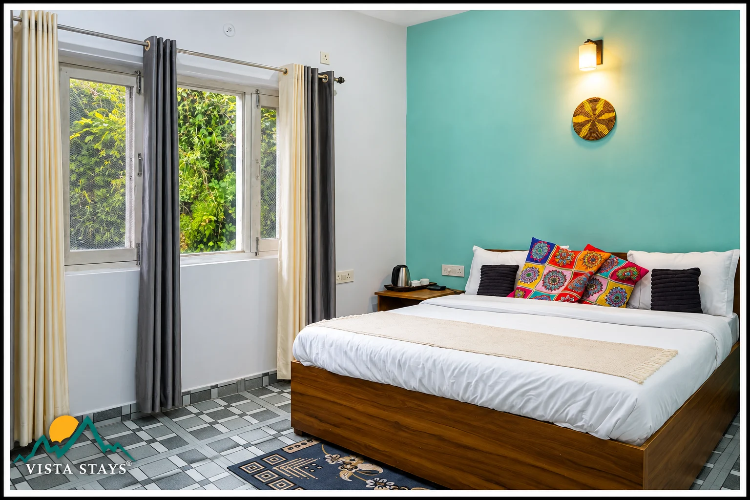 A turquoise-accented bedroom at Hidden Lake by Vista Stays.
