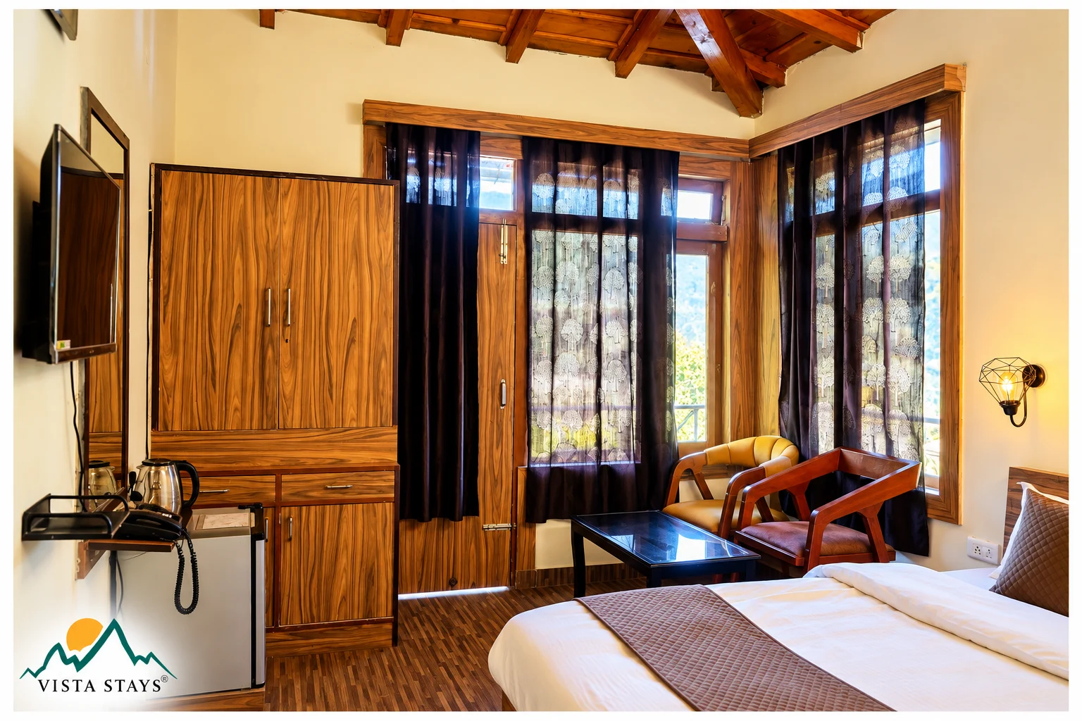 A timber-ceiling bedroom at The Raikwal's Hotel & Restaurant.